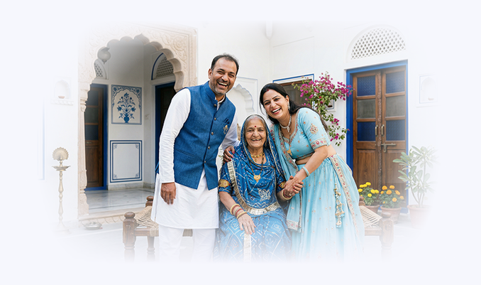 Couple smiling with grandmother